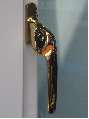 Gold silver cranked handle