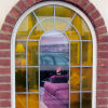 Curved slimline heritage window with leads.