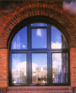 Curved aluminium black window.