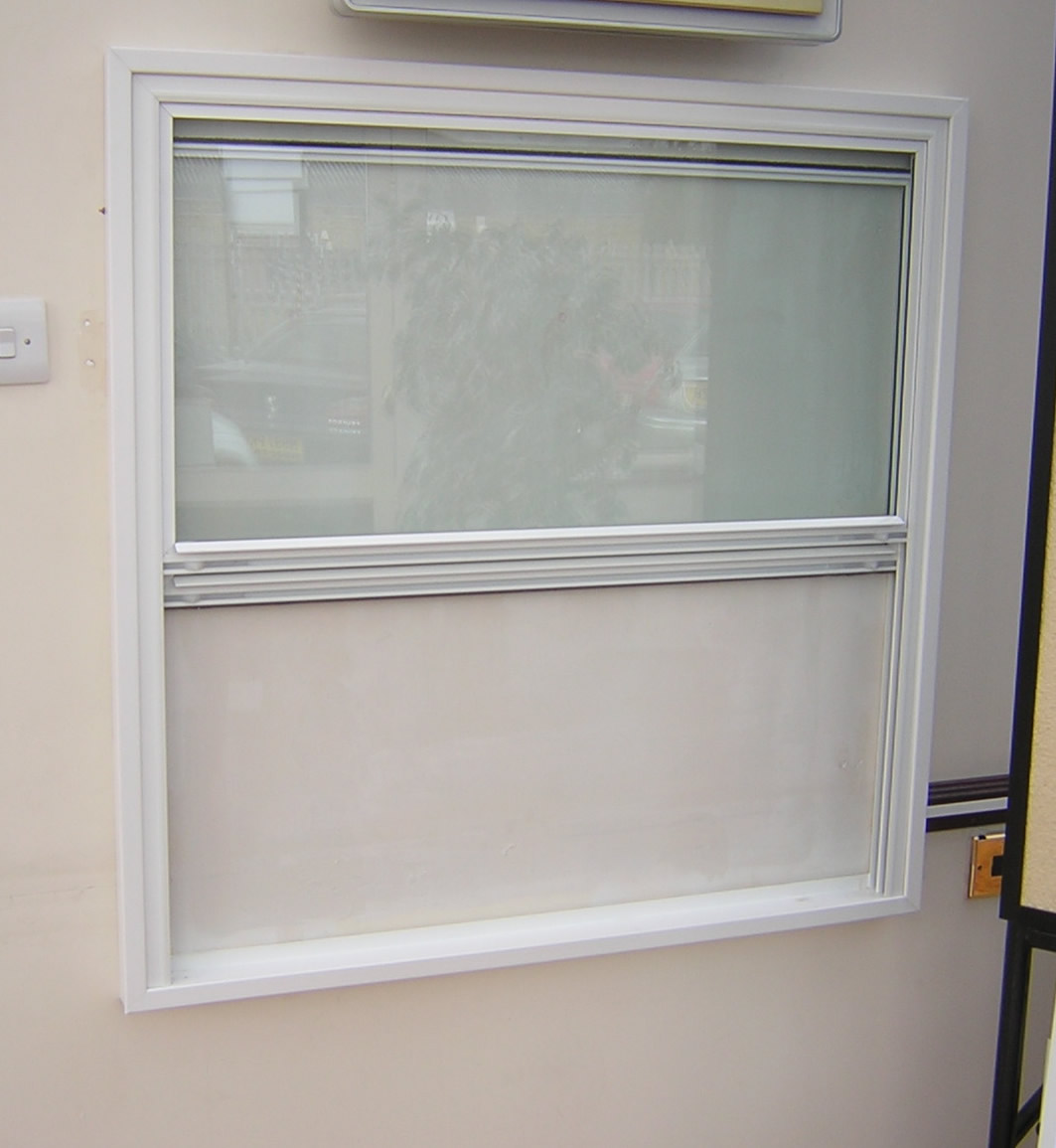 Unbalanced Vertical Sliding Secondary Glazing
